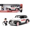 1939 Chevrolet Master Deluxe Black and White "Monopoly" and Mr. Monopoly Diecast Figure "Hollywood Rides" Series 1/24 Diecast Model Car by Jada